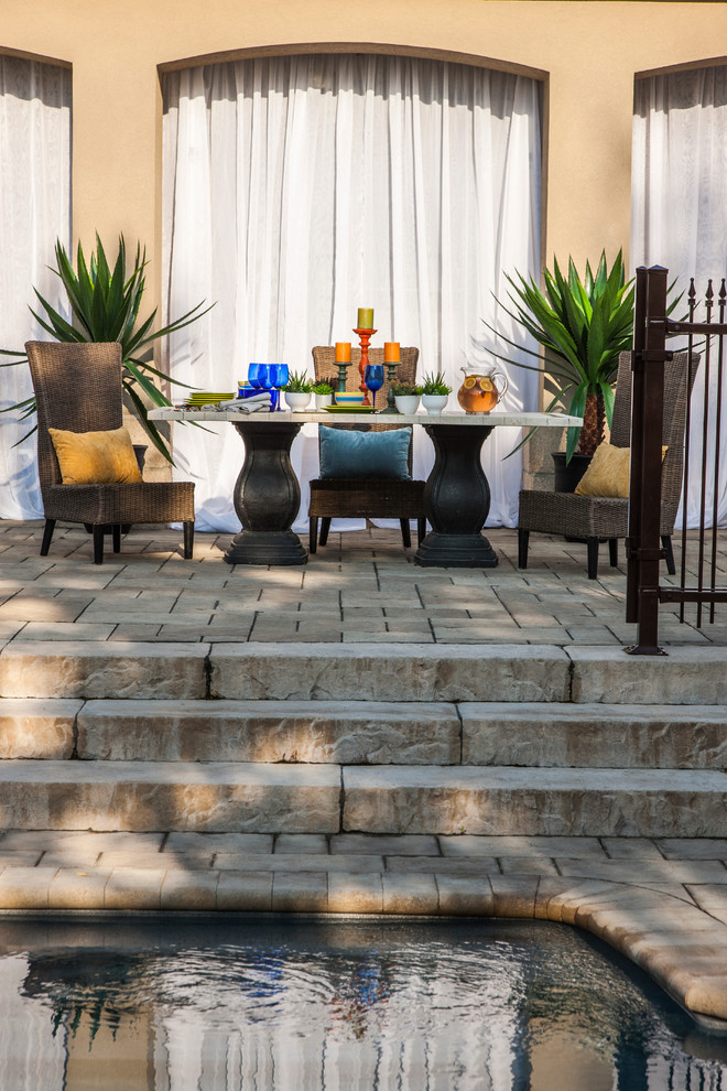 Inspiration for a mid-sized rustic backyard landscaping.