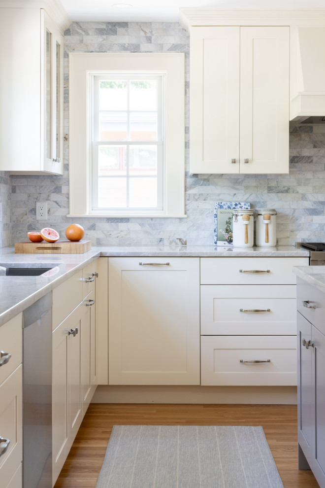 Kitchen photo in Boston with quartzite countertops, gray backsplash, marble backsplash and gray countertops
