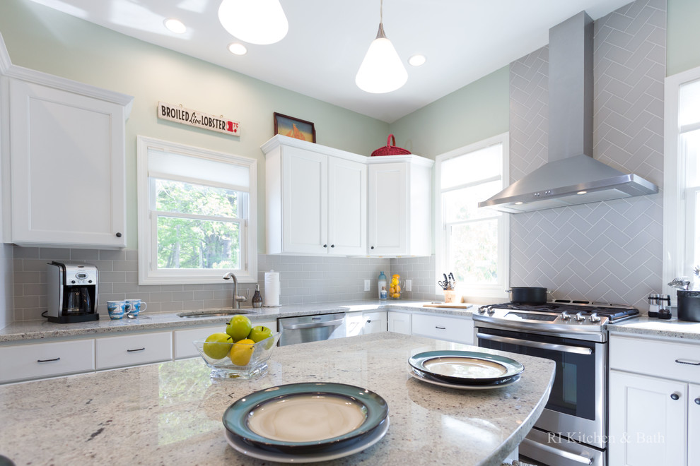 Large transitional l-shaped porcelain tile eat-in kitchen photo in Providence with an undermount sink, recessed-panel cabinets, white cabinets, granite countertops, gray backsplash, ceramic backsplash, stainless steel appliances, green walls and an island