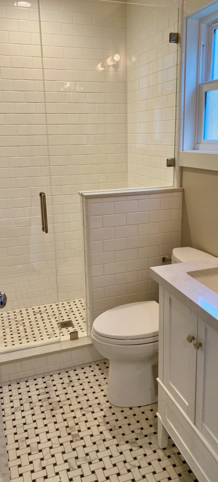 Photo of a small transitional 3/4 bathroom in San Francisco with shaker cabinets, white cabinets, a double shower, a two-piece toilet, red tile, ceramic tile, black walls, porcelain floors, an undermount sink, quartzite benchtops, black floor, a hinged shower door, beige benchtops, a single vanity and a freestanding vanity.