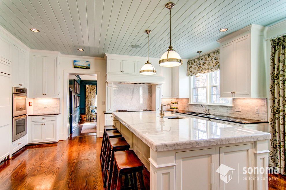 Design ideas for a traditional kitchen in Charlotte with marble benchtops.