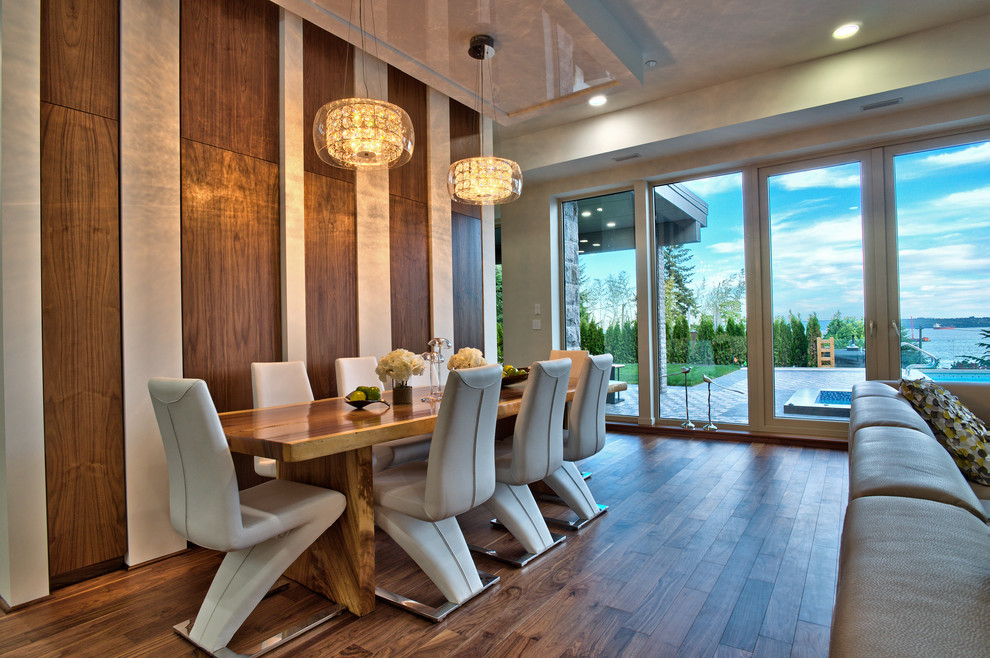 Photo of a large contemporary open plan dining in Vancouver with dark hardwood floors, white walls and no fireplace.