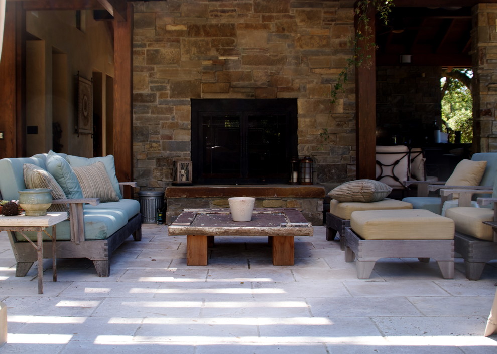Photo of a contemporary patio in San Francisco with with fireplace.