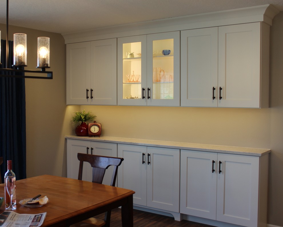 Inspiration for a transitional kitchen remodel with recessed-panel cabinets, white cabinets, quartz countertops and an island
