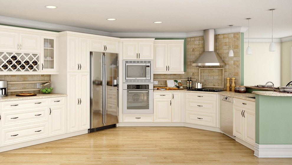 Inspiration for a large transitional u-shaped light wood floor and beige floor eat-in kitchen remodel in Miami with an undermount sink, raised-panel cabinets, white cabinets, granite countertops, brown backsplash, stone tile backsplash, stainless steel appliances, a peninsula and brown countertops