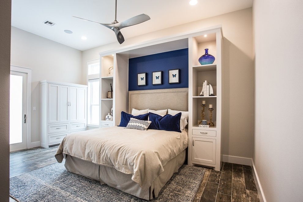 Large transitional bedroom in Houston.