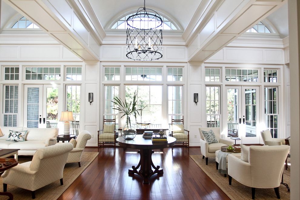 Photo of a traditional living room in Charleston with white walls.