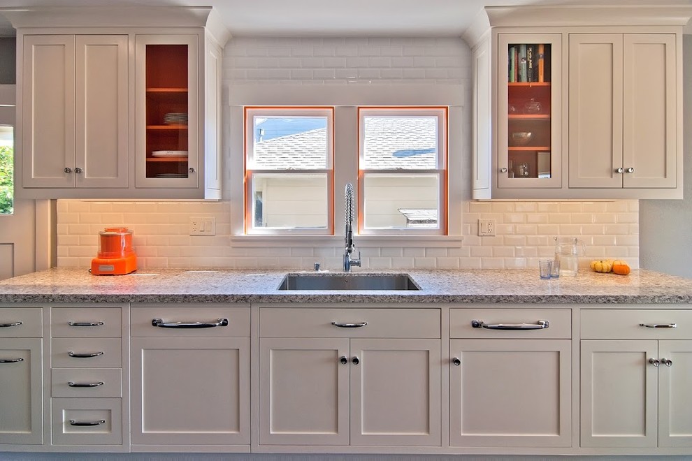 Inspiration for an eclectic kitchen in San Francisco with subway tile splashback.