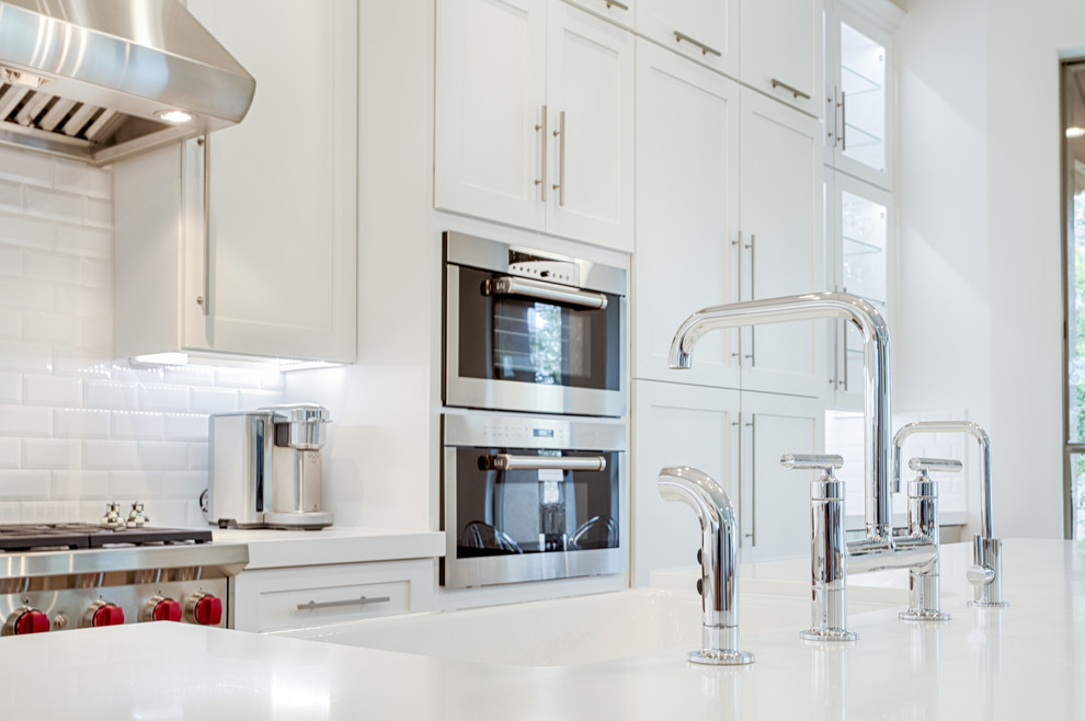 Inspiration for a large transitional galley open concept kitchen remodel in Phoenix with shaker cabinets and an island
