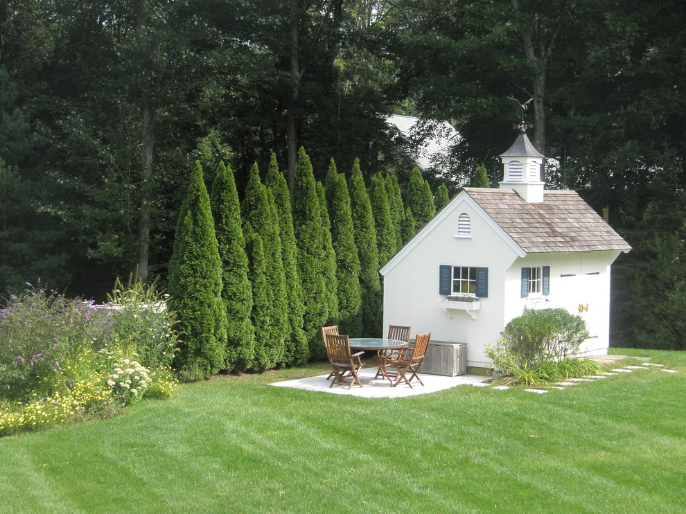 Photo of a large traditional detached garden shed in New York.