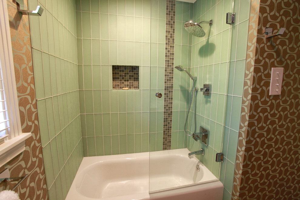 Inspiration for a small contemporary master bathroom in Houston with flat-panel cabinets, medium wood cabinets, engineered quartz benchtops, an alcove tub, a shower/bathtub combo, a one-piece toilet, green tile, glass tile, green walls and limestone floors.