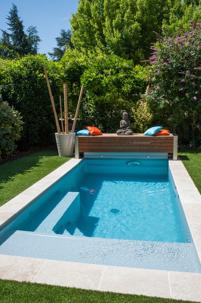 This is an example of a small contemporary rectangular pool in Other.