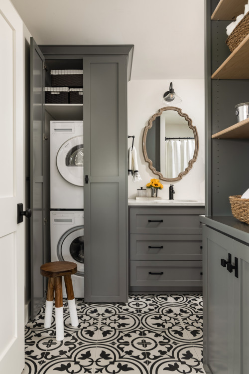 Small cottage porcelain tile, multicolored floor and single-sink bathroom/laundry room photo in Portland with shaker cabinets, gray cabinets, white walls, an undermount sink, quartz countertops, white countertops and a built-in vanity