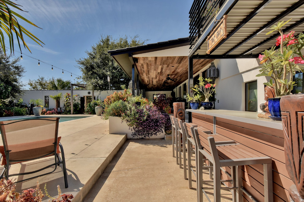 Example of an eclectic home design design in Austin