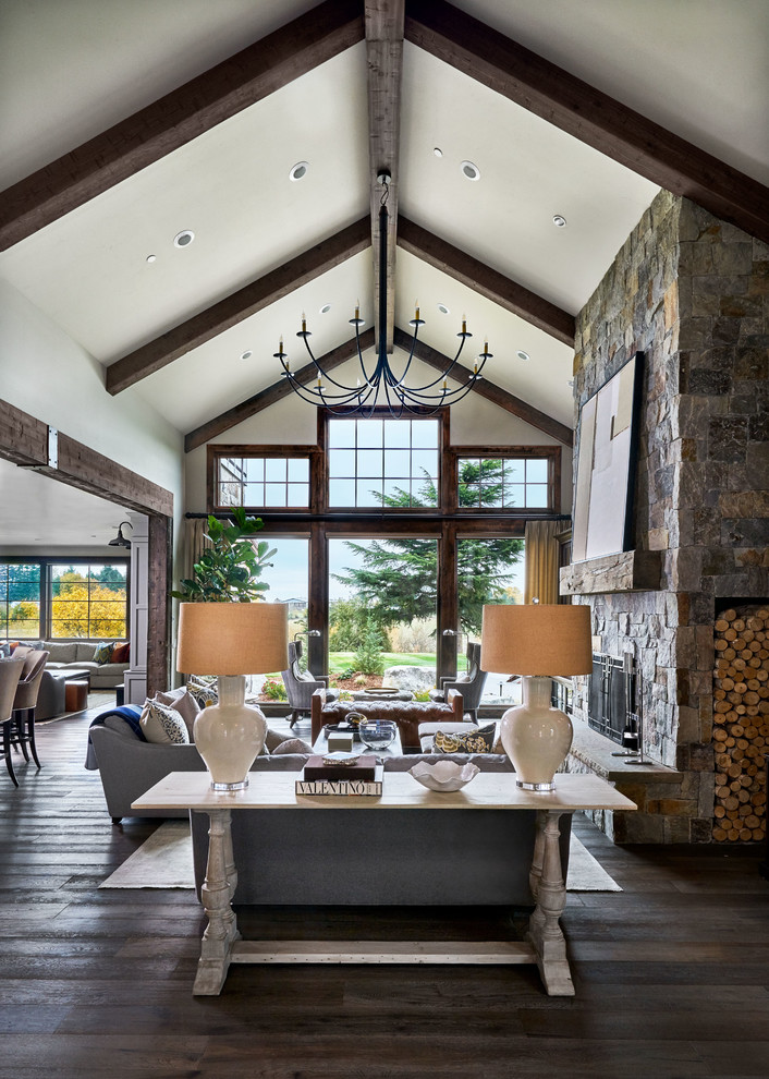 Design ideas for a large country open concept living room in Portland with white walls, medium hardwood floors, a standard fireplace and a stone fireplace surround.