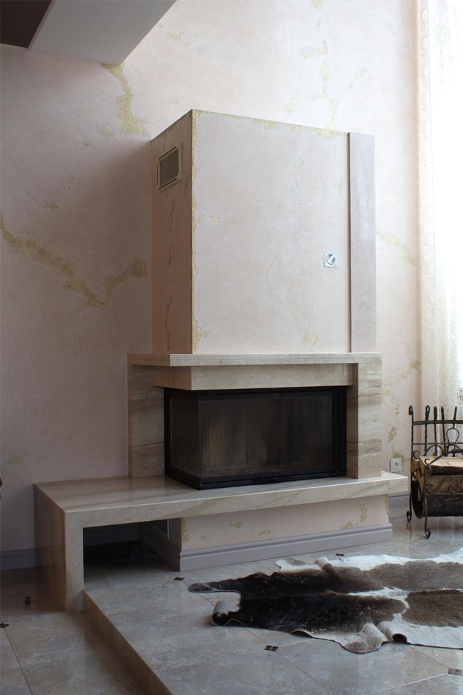 Современный камин с угловым стеклом