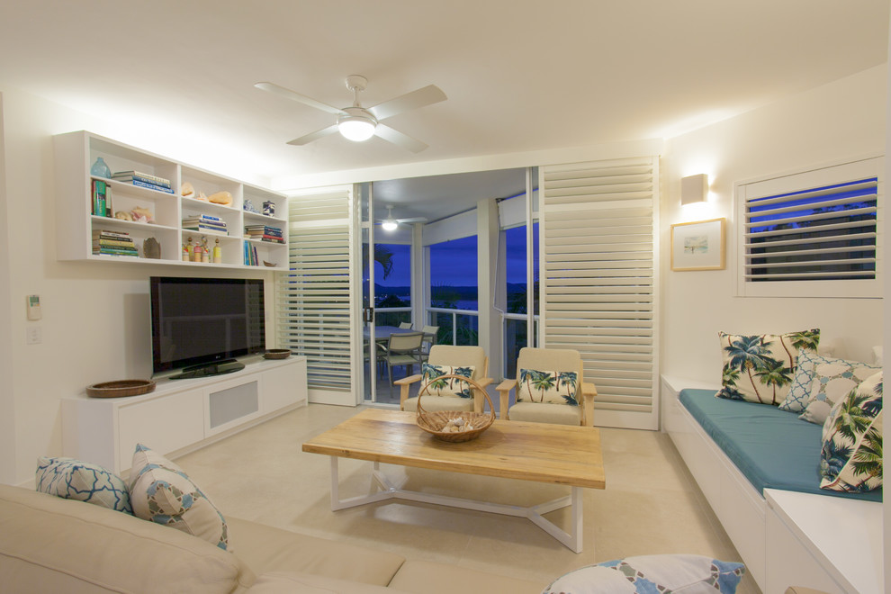 Inspiration for a contemporary living room in Sunshine Coast with white walls, ceramic floors and a freestanding tv.