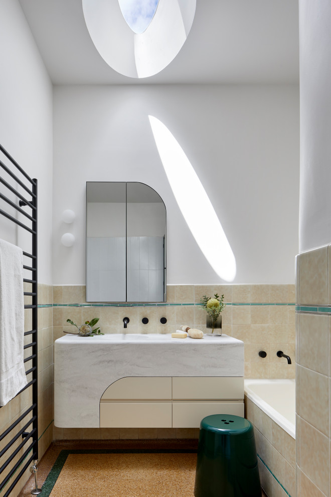 Mid-sized contemporary master bathroom in Melbourne with yellow cabinets, yellow tile, ceramic tile, white walls, terrazzo floors, an integrated sink, solid surface benchtops, yellow floor, grey benchtops, a single vanity and coffered.