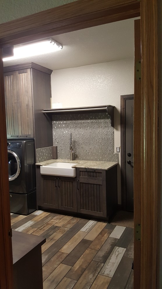 Example of an arts and crafts laundry room design in Denver