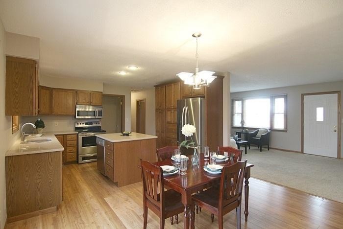 Example of a transitional dining room design in Cedar Rapids