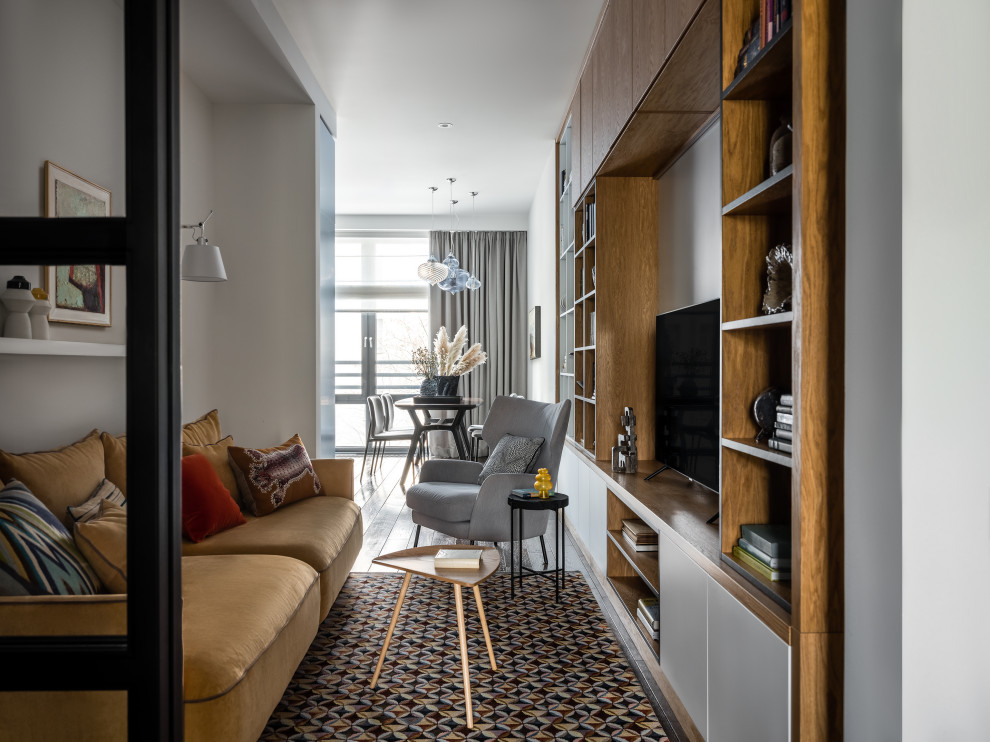 На фото: гостиная комната среднего размера в современном стиле с