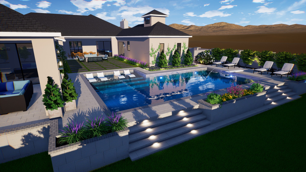 Large backyard stone pool landscaping photo in Phoenix