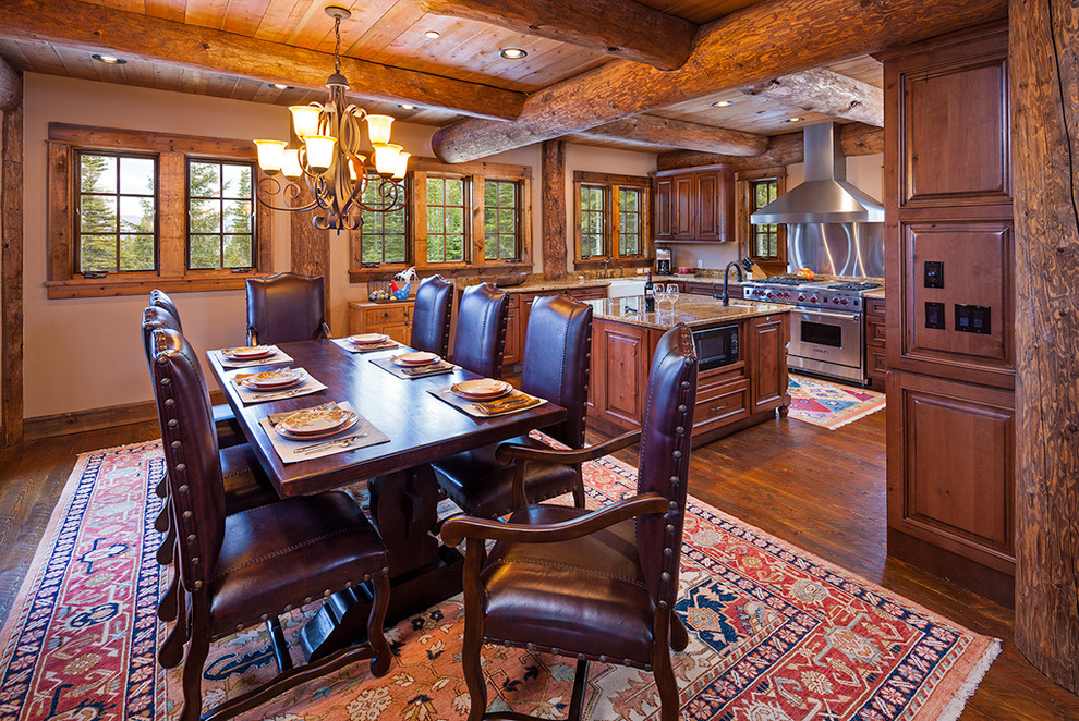 Kitchen/dining room combo - huge rustic dark wood floor kitchen/dining room combo idea