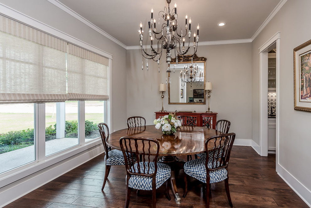Example of a transitional dining room design in Austin