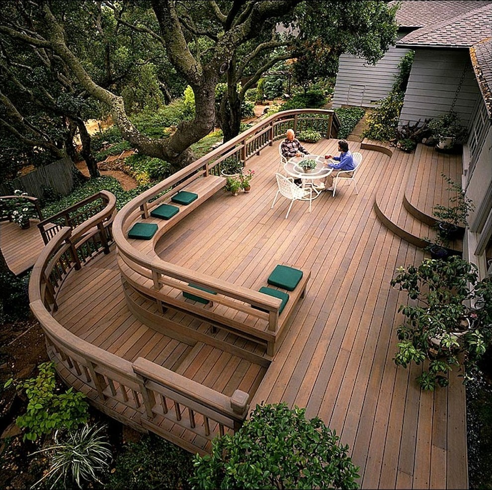 This is an example of an expansive contemporary backyard deck in San Francisco with no cover.