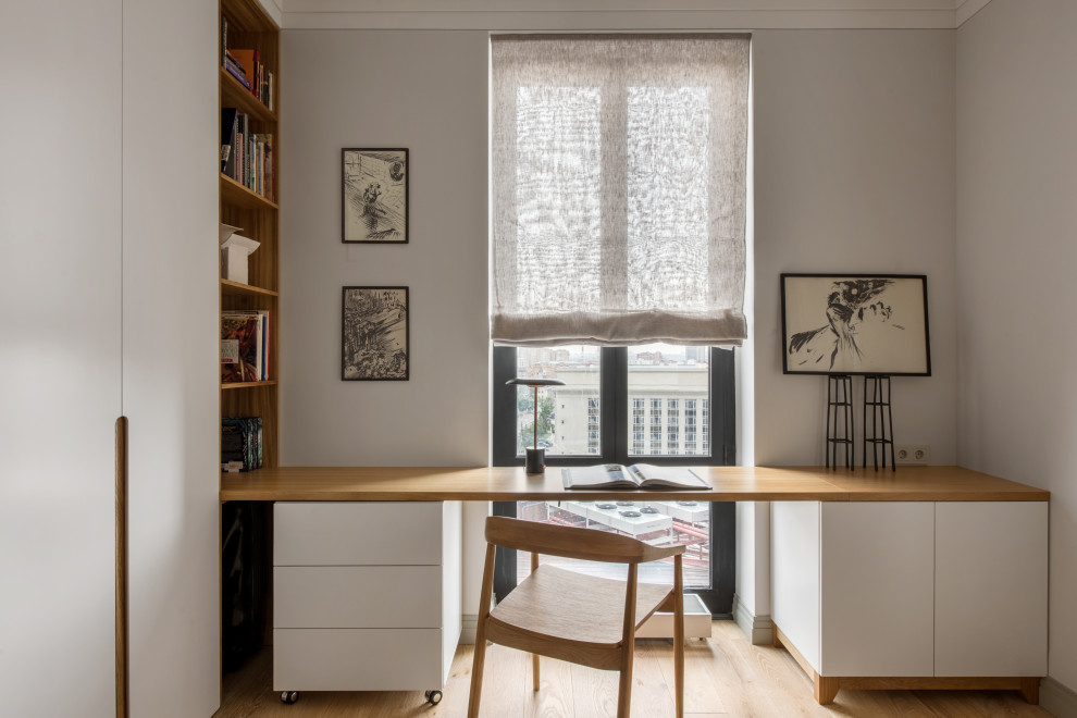 Exempel på ett mellanstort minimalistiskt arbetsrum