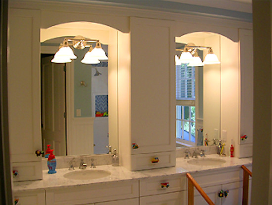 Bathroom - mid-sized transitional master bathroom idea in Boston with a drop-in sink, white cabinets, granite countertops, white walls and recessed-panel cabinets