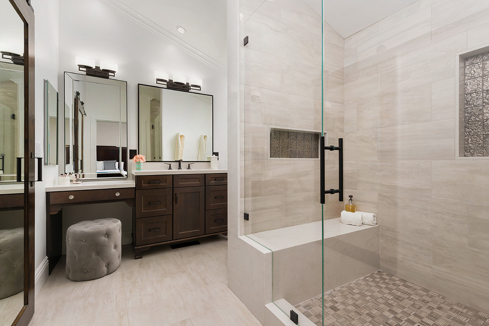 Design ideas for a mid-sized traditional master bathroom in San Francisco with brown cabinets, an alcove shower, a one-piece toilet, porcelain floors, engineered quartz benchtops, beige floor, a hinged shower door, an undermount sink, shaker cabinets and white walls.