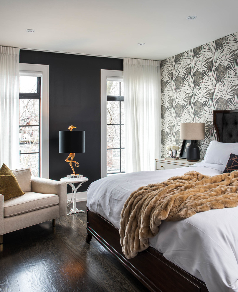 Photo of a transitional master bedroom in Toronto with multi-coloured walls and dark hardwood floors.