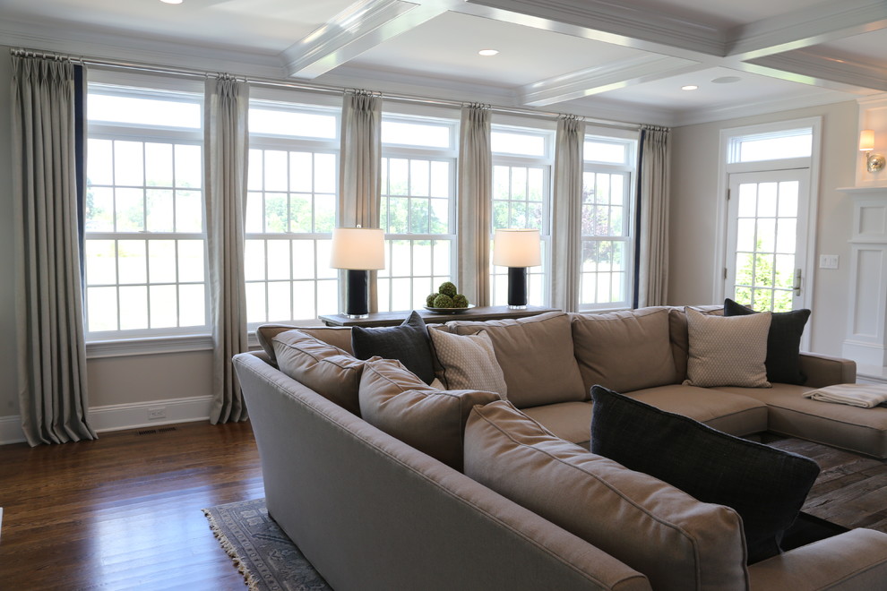 This is an example of a large traditional open concept family room in New York.