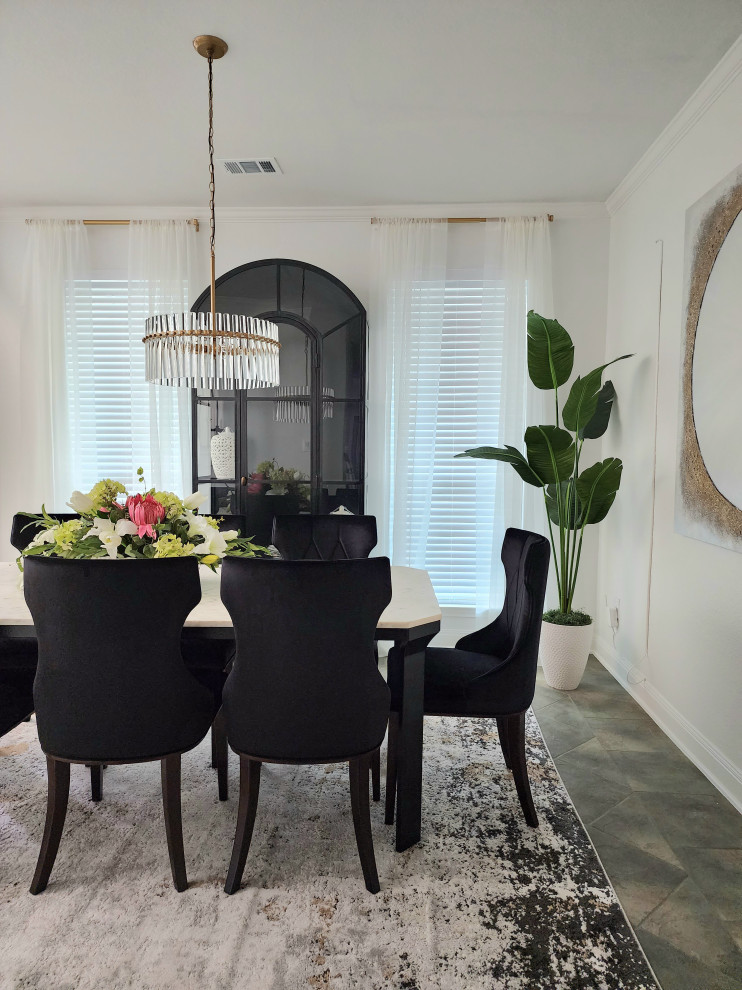 Inspiration for a mid-sized modern dining room in Austin with white walls, ceramic floors, a corner fireplace and a plaster fireplace surround.