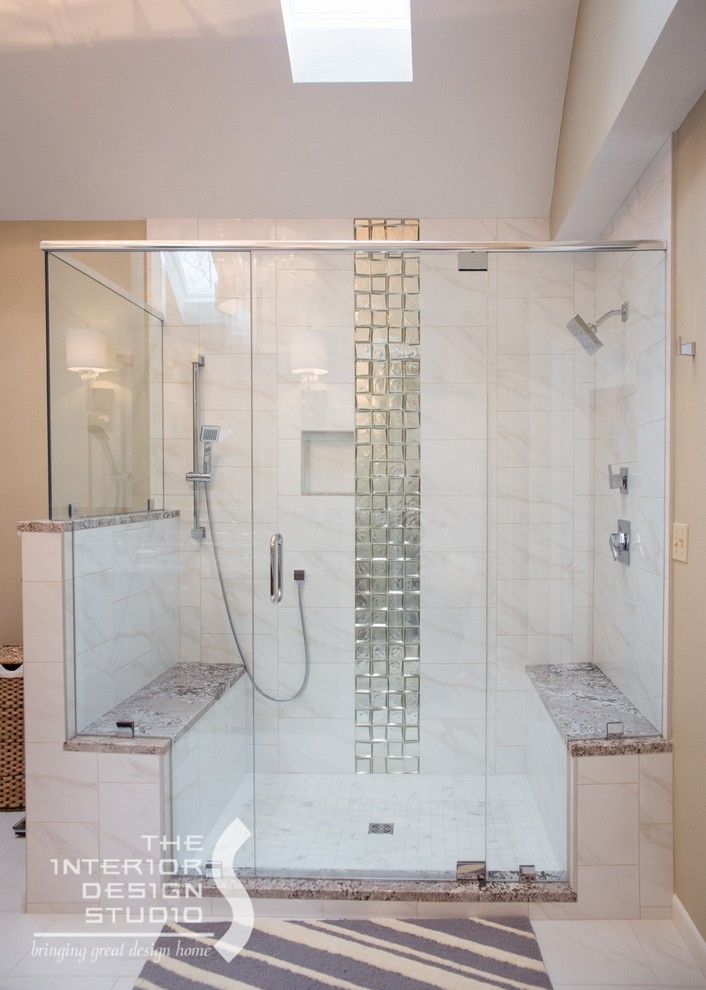 Photo of a large classic ensuite bathroom in Cleveland with a submerged sink, shaker cabinets, medium wood cabinets, granite worktops, a double shower, white tiles, ceramic tiles, beige walls and ceramic flooring.