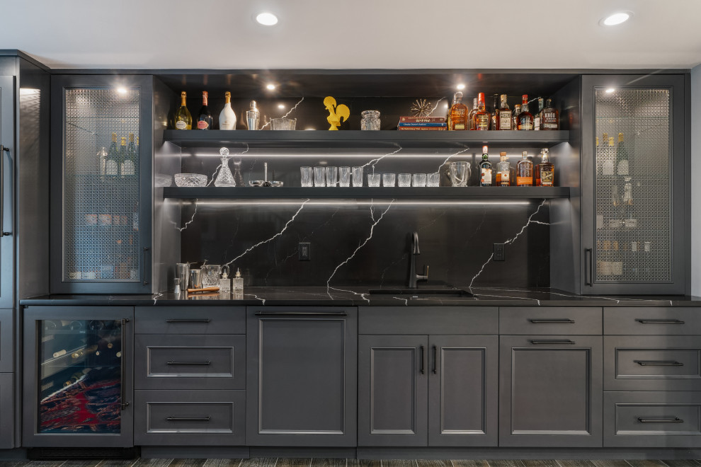 Design ideas for a mid-sized contemporary single-wall home bar in Denver with an undermount sink, recessed-panel cabinets, blue cabinets, quartz benchtops, black splashback, engineered quartz splashback, ceramic floors, grey floor and black benchtop.