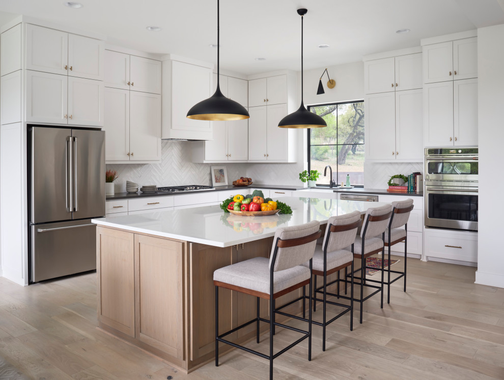 Example of a transitional kitchen design in Austin