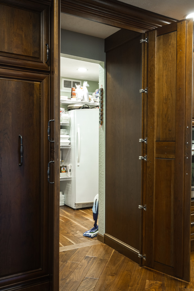 Large transitional l-shaped kitchen pantry photo with two islands