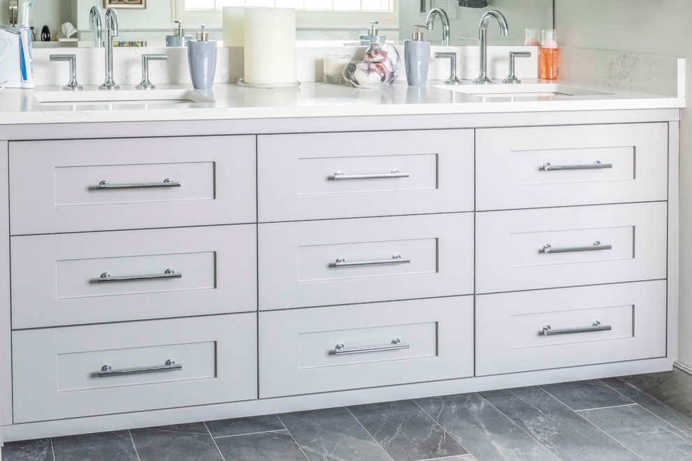 Home design - mid-sized transitional 3/4 medium tone wood floor and brown floor home design idea in Calgary with furniture-like cabinets, white cabinets and an undermount sink