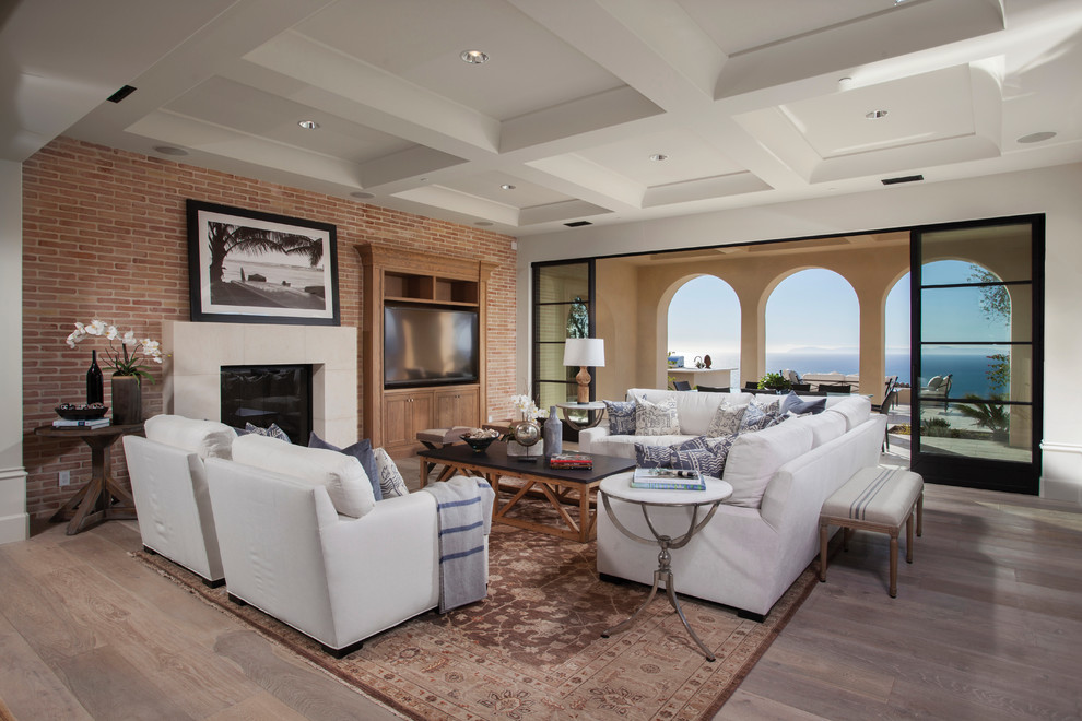 Design ideas for a mediterranean formal living room in Orange County with a standard fireplace.
