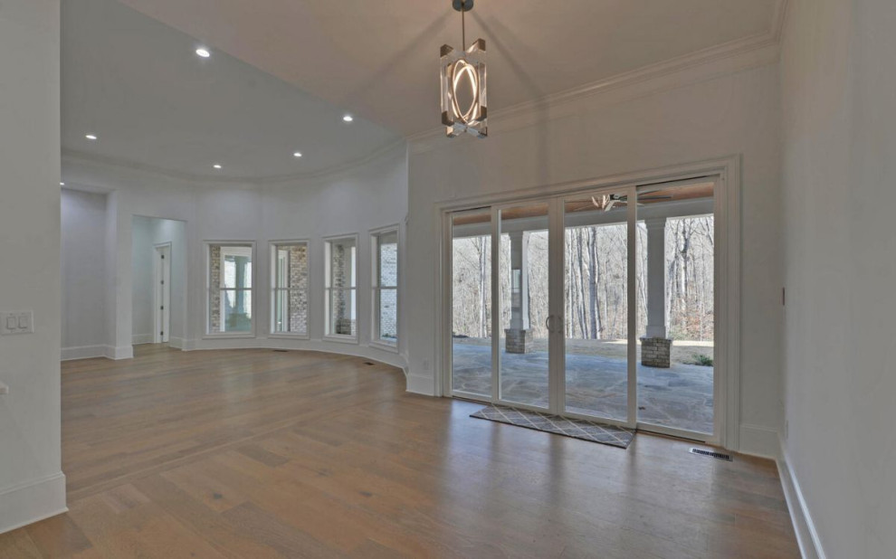 Example of a transitional home design design in Atlanta