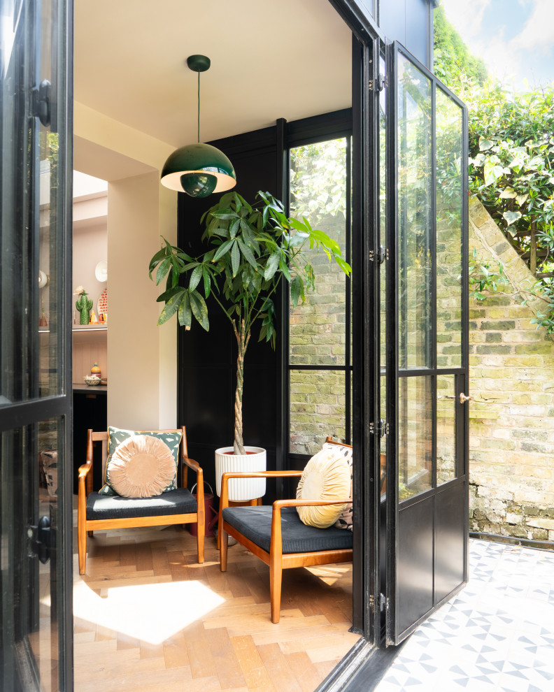 Inspiration for a contemporary sunroom remodel in London