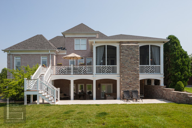 Two Story Double Porch With Outdoor Fireplace Travertine Patio