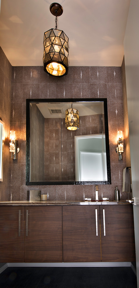 This is an example of a small modern powder room in Chicago with flat-panel cabinets, brown cabinets, brown walls and an undermount sink.