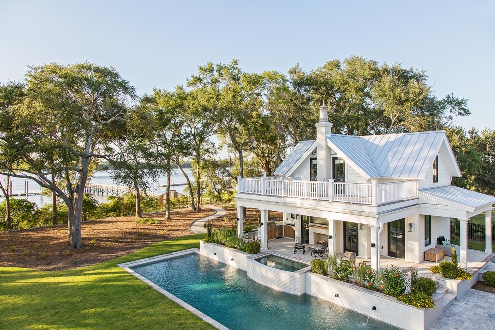 Photo of a beach style home design in Charleston.