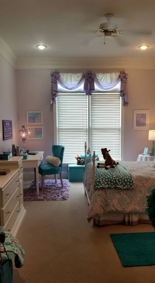 This is an example of a transitional kids' room in Other.