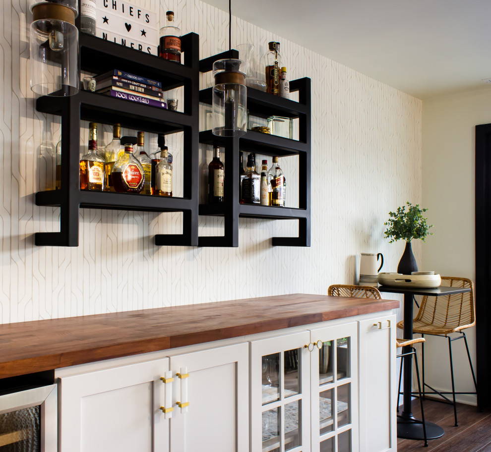 Mid-sized contemporary single-wall home bar in Philadelphia with no sink, white cabinets and wood benchtops.