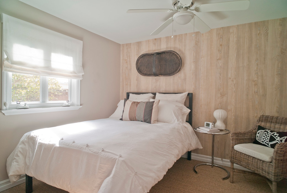 Inspiration for a beach style bedroom in Los Angeles with beige walls.