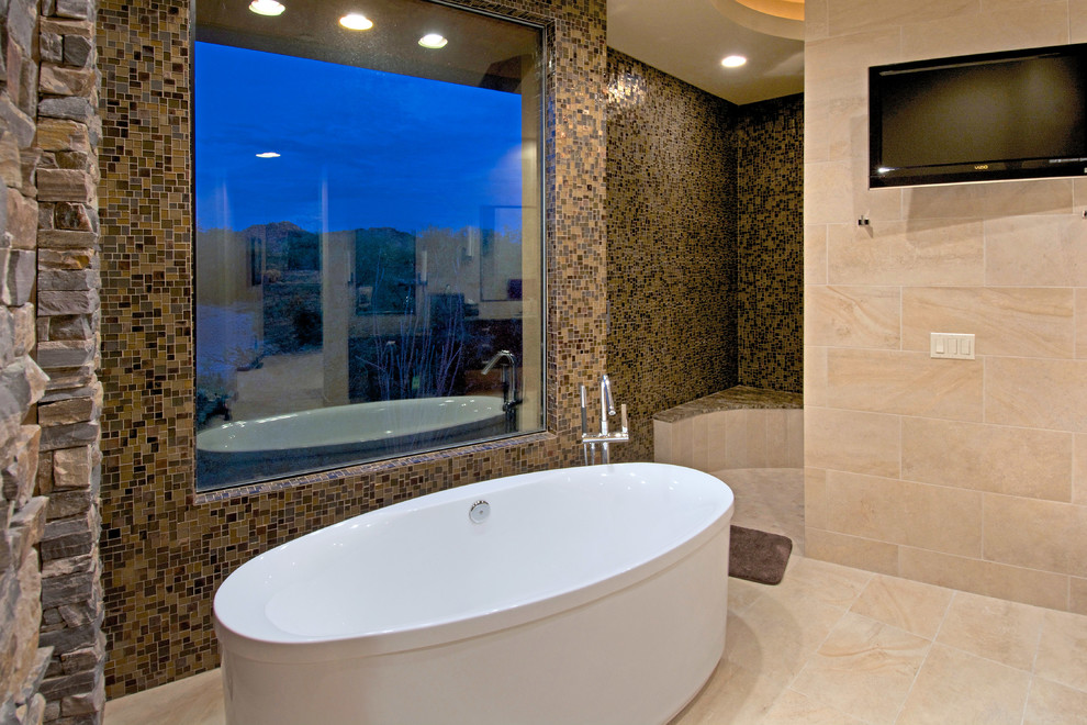 Design ideas for a large contemporary master bathroom in Phoenix with a freestanding tub, a corner shower, brown tile, glass tile, beige walls, porcelain floors, beige floor and an open shower.